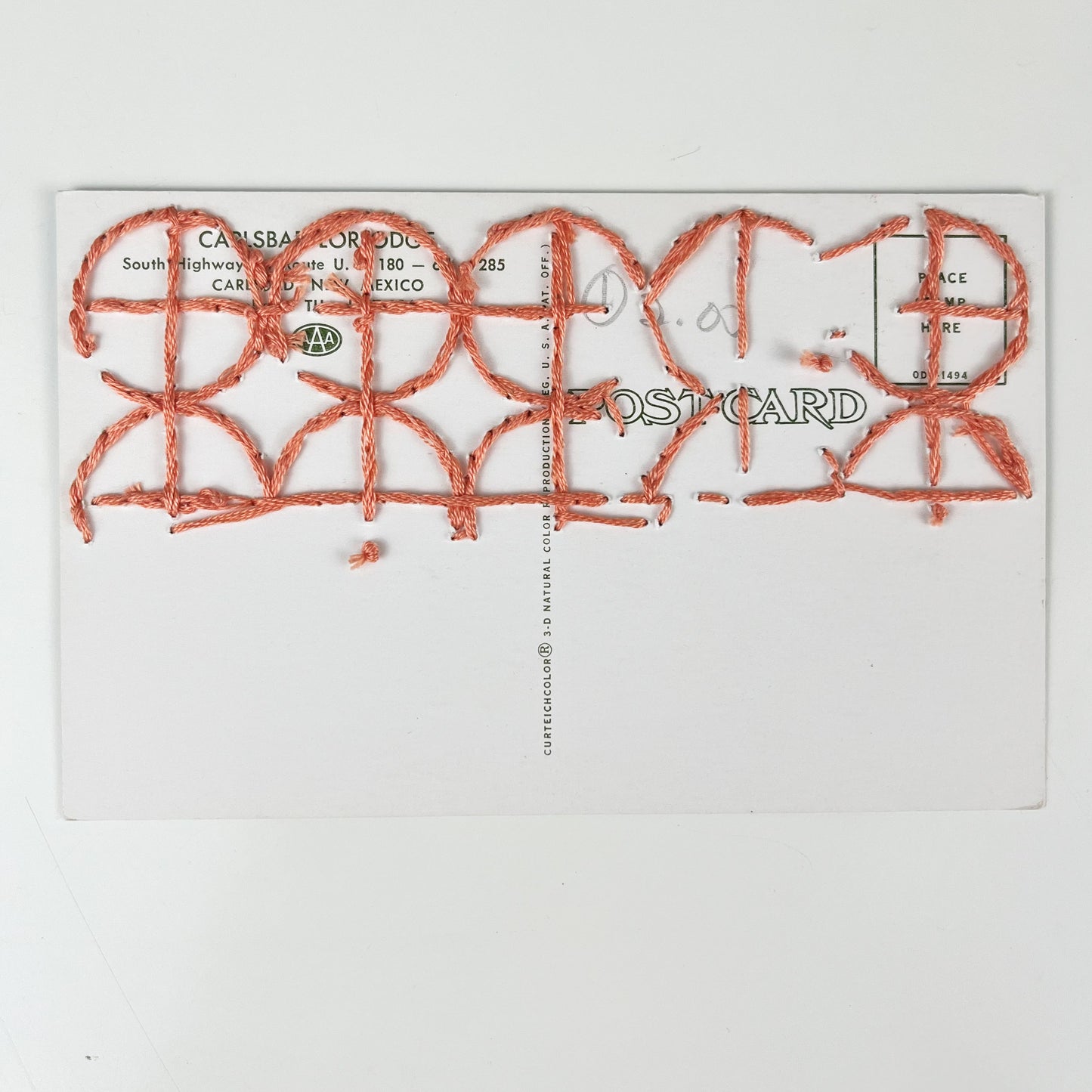 back side of a hand stitched postcard