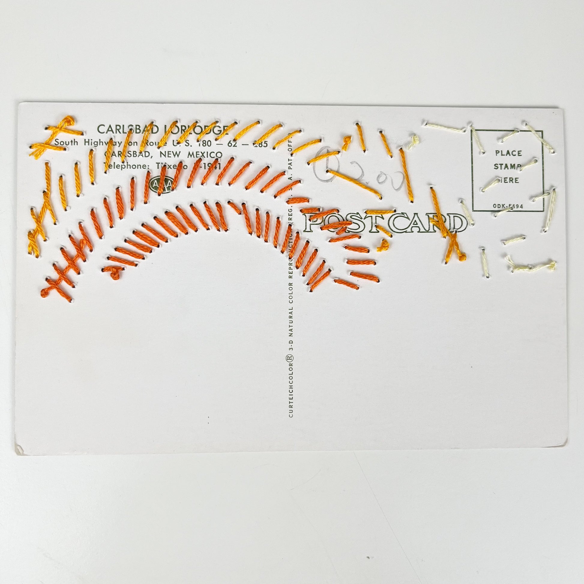 back side of a hand stitched postcard