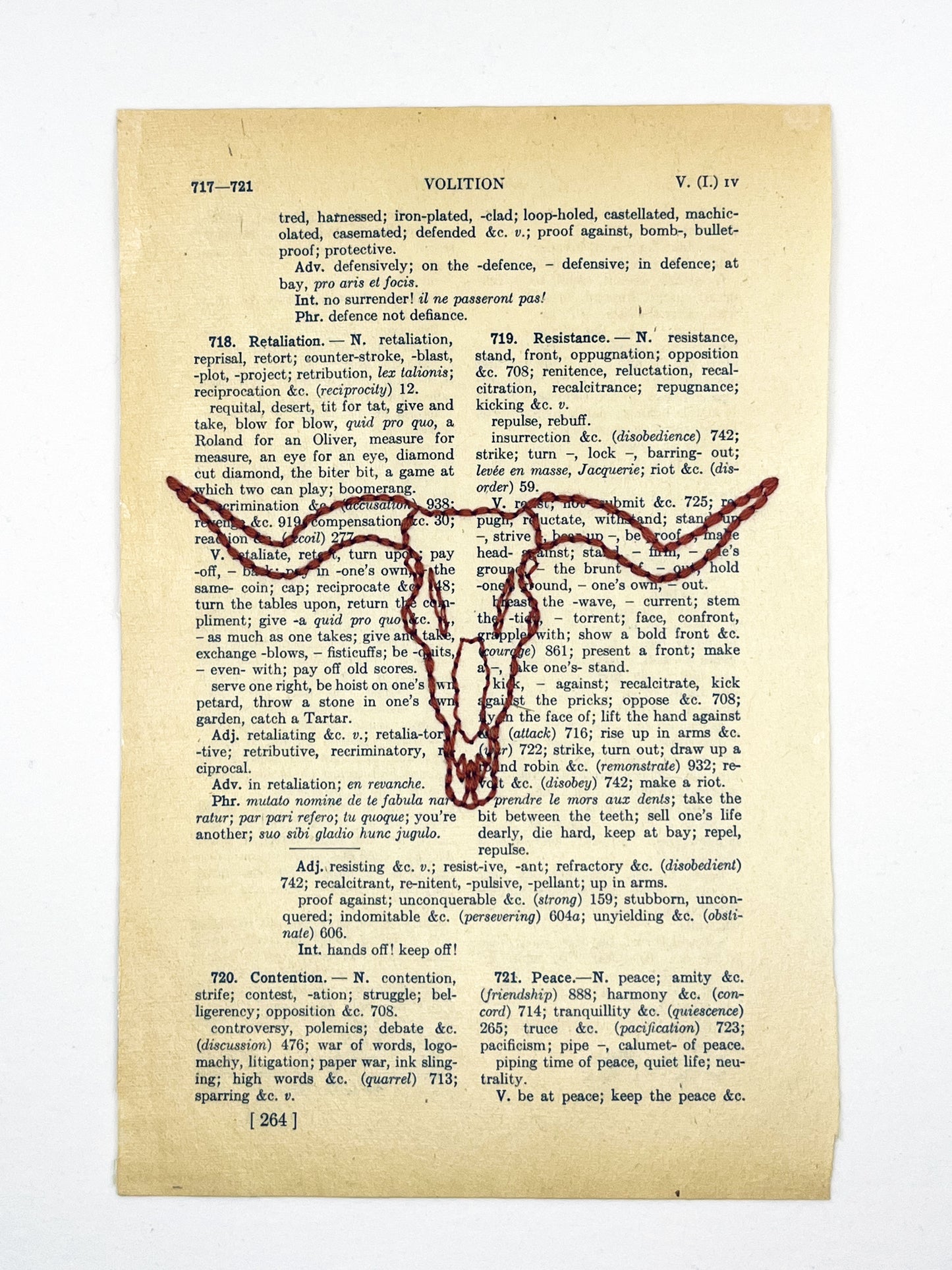 a vintage thesaurus page hand embroidered in rust colored thread with a longhorn skull on a white background